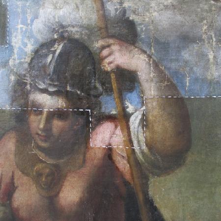 Pulitura di un dipinto ad olio su tela.